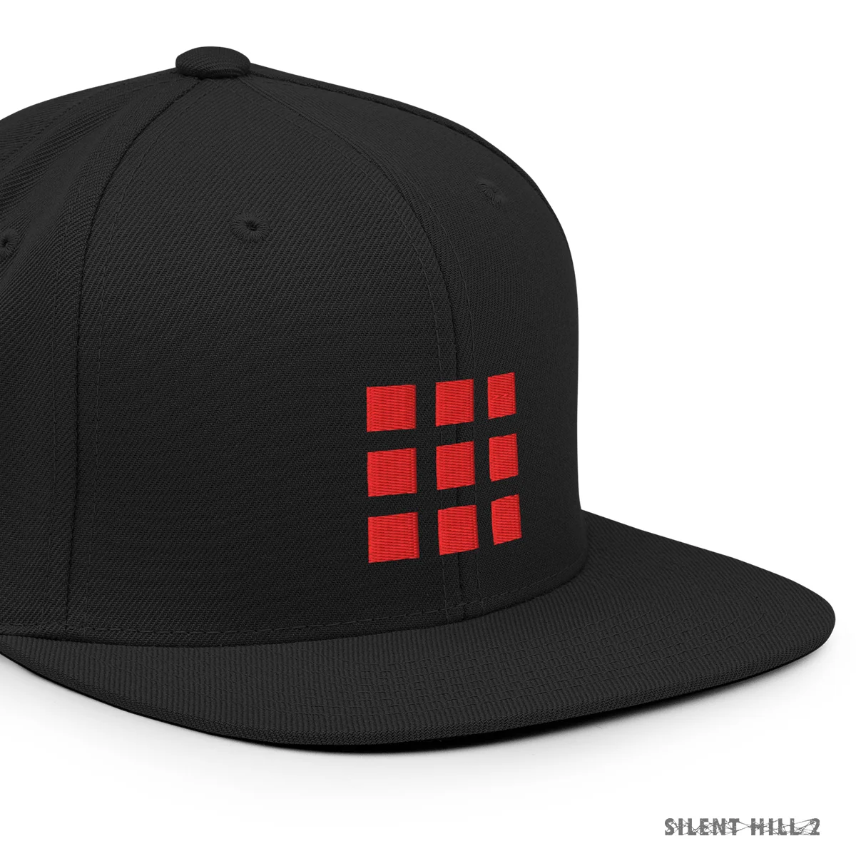 Rød snapback-kasket med grøn undervisor