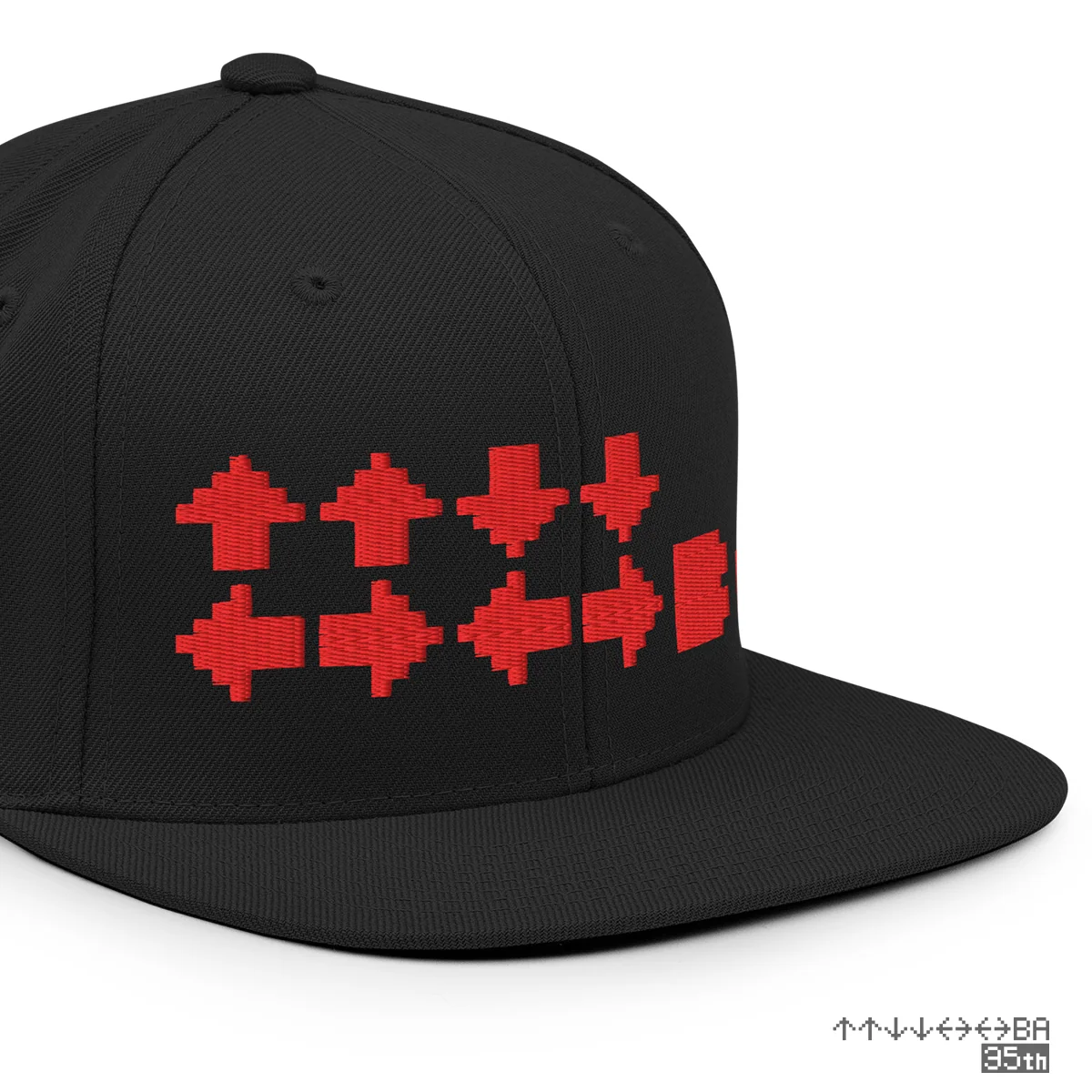 ↑↑↓↓←→←→BA Six-Panel Structured Cap with Snap Closure